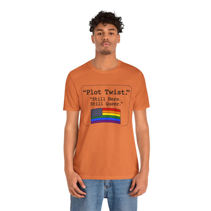Plot Twist Tee — "Still Here. Still Queer." | Pride Celebration Line