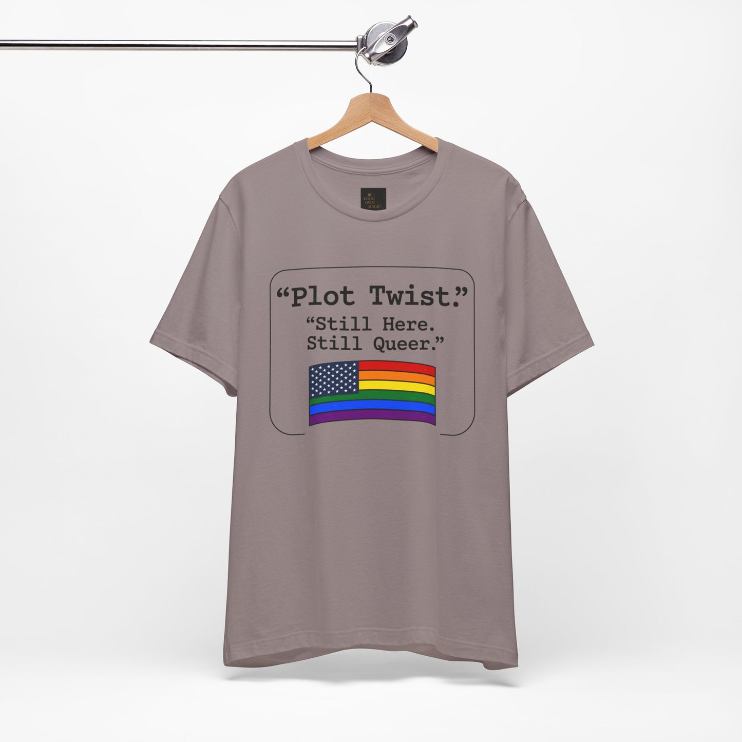Plot Twist Tee — "Still Here. Still Queer." | Pride Celebration Line
