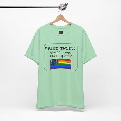 Plot Twist Tee — "Still Here. Still Queer." | Pride Celebration Line