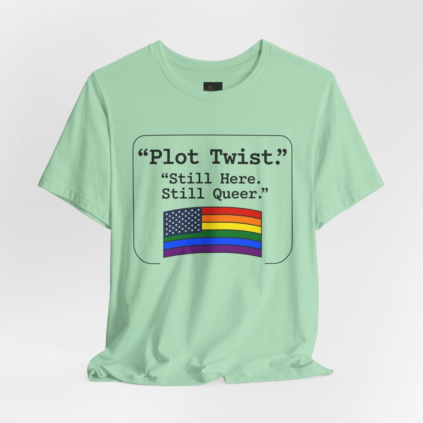 Plot Twist Tee — "Still Here. Still Queer." | Pride Celebration Line