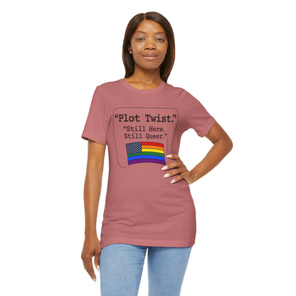 Plot Twist Tee — "Still Here. Still Queer." | Pride Celebration Line