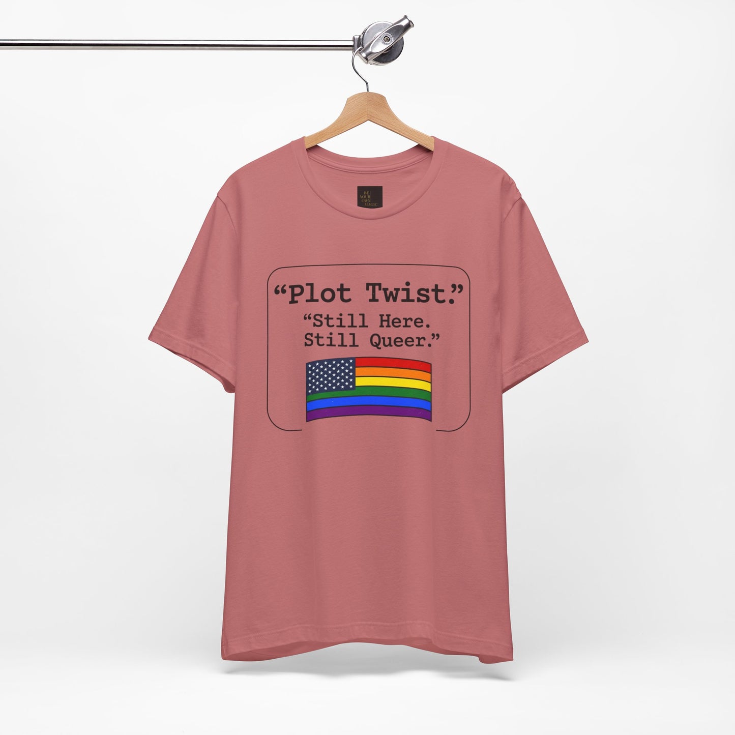 Plot Twist Tee — "Still Here. Still Queer." | Pride Celebration Line